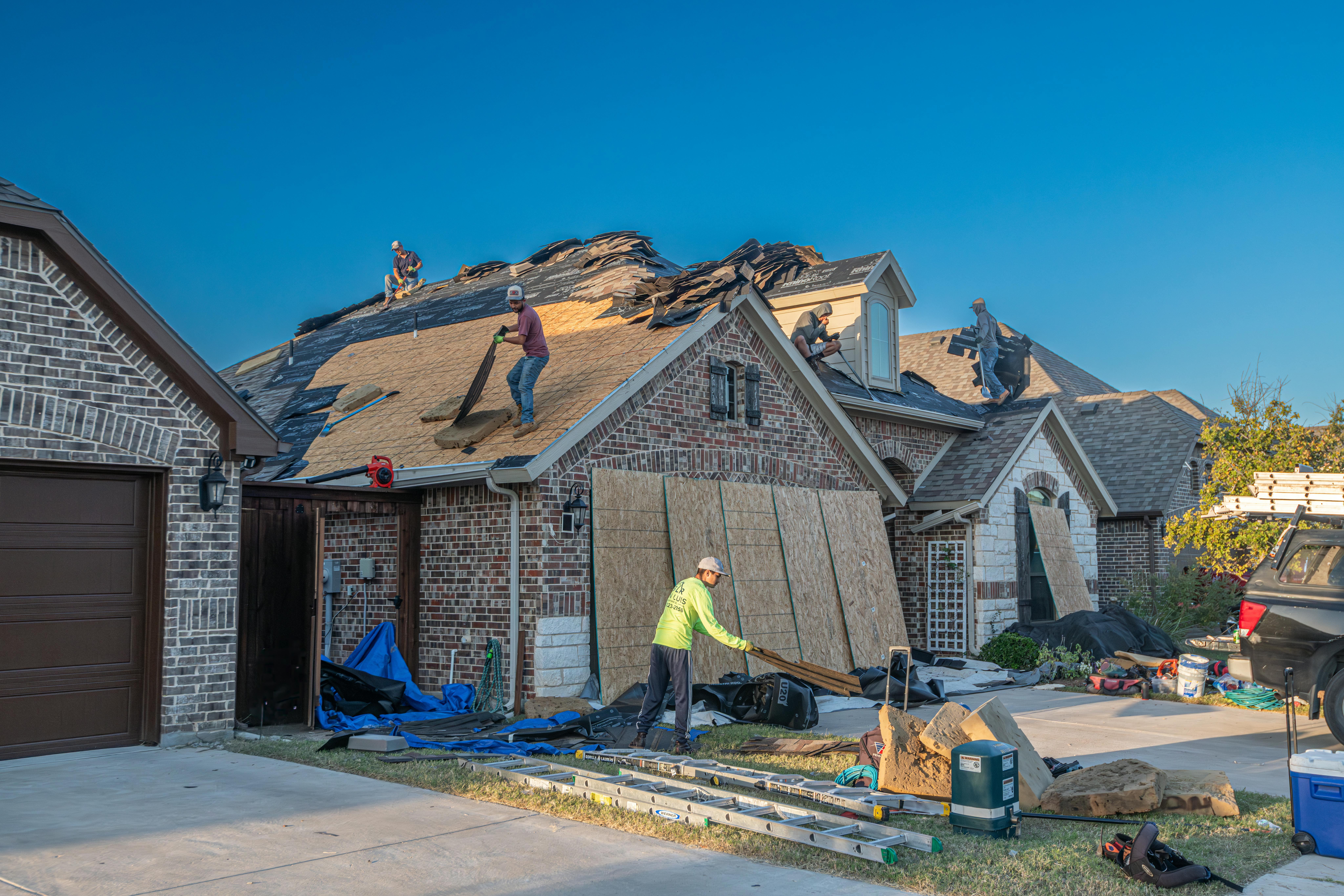 Professional roofing contractor at work
