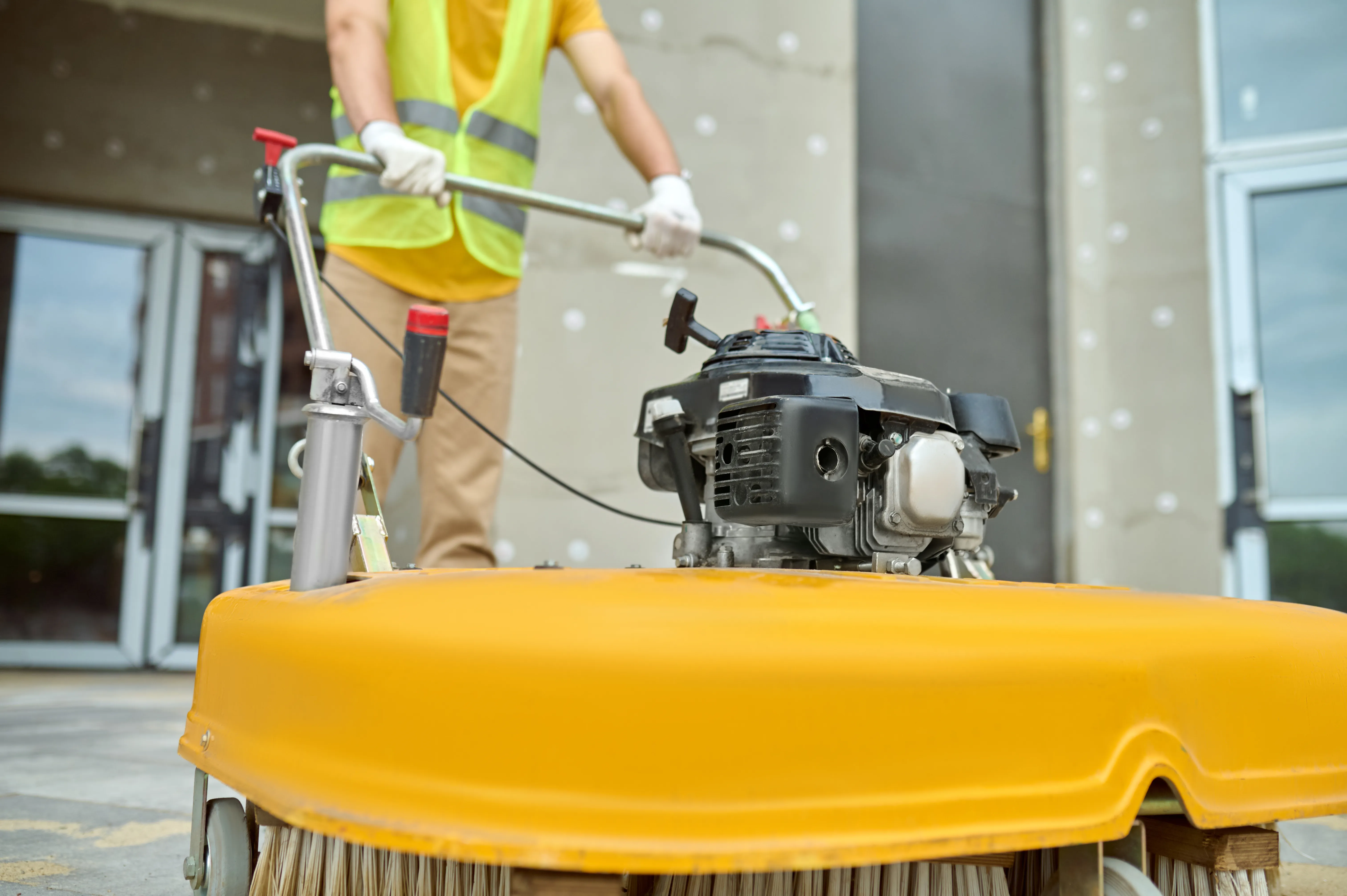 Picture of surface being pressure washed